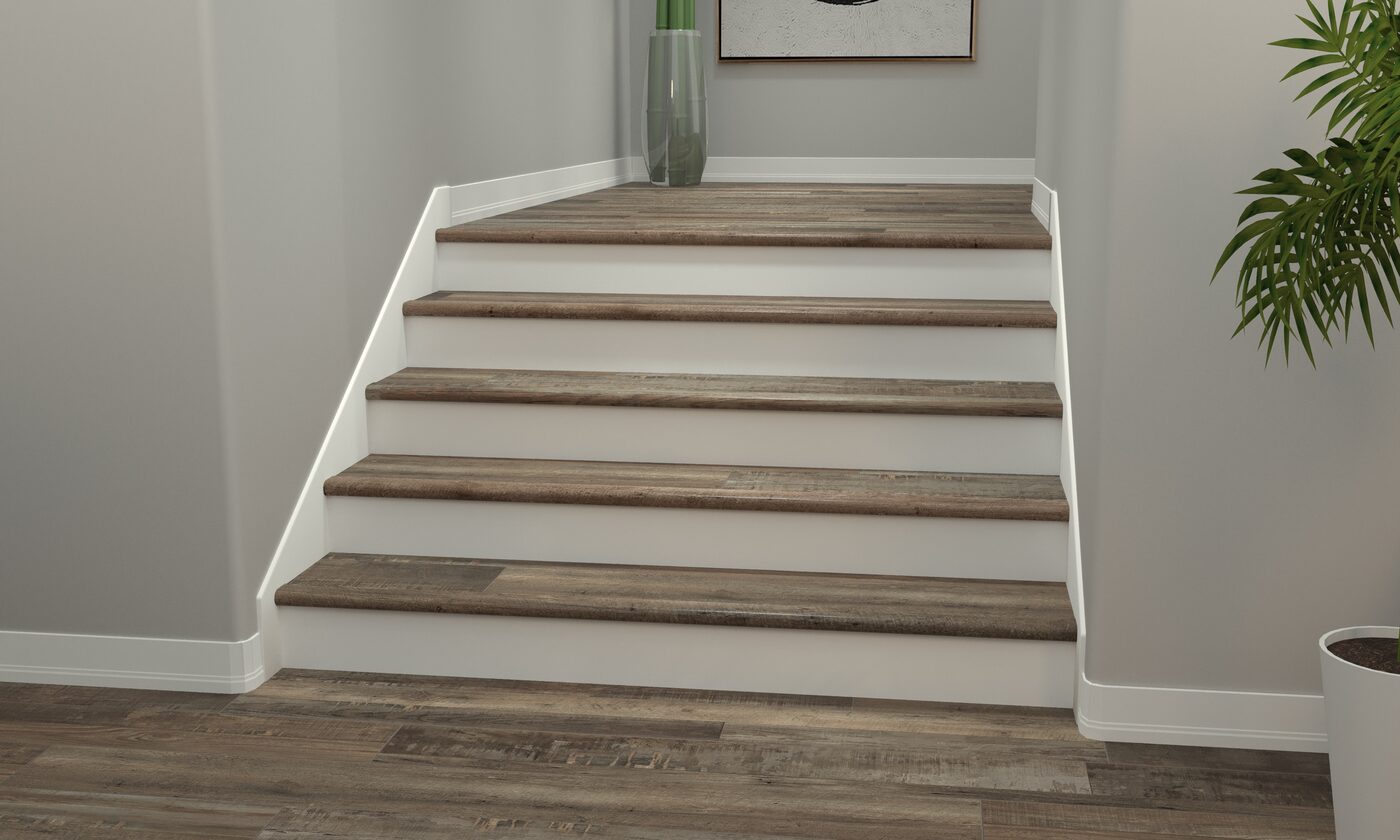 Coordinated luxury vinyl stair nosing matching LVP flooring planks — Cavalieri Flooring Orlando